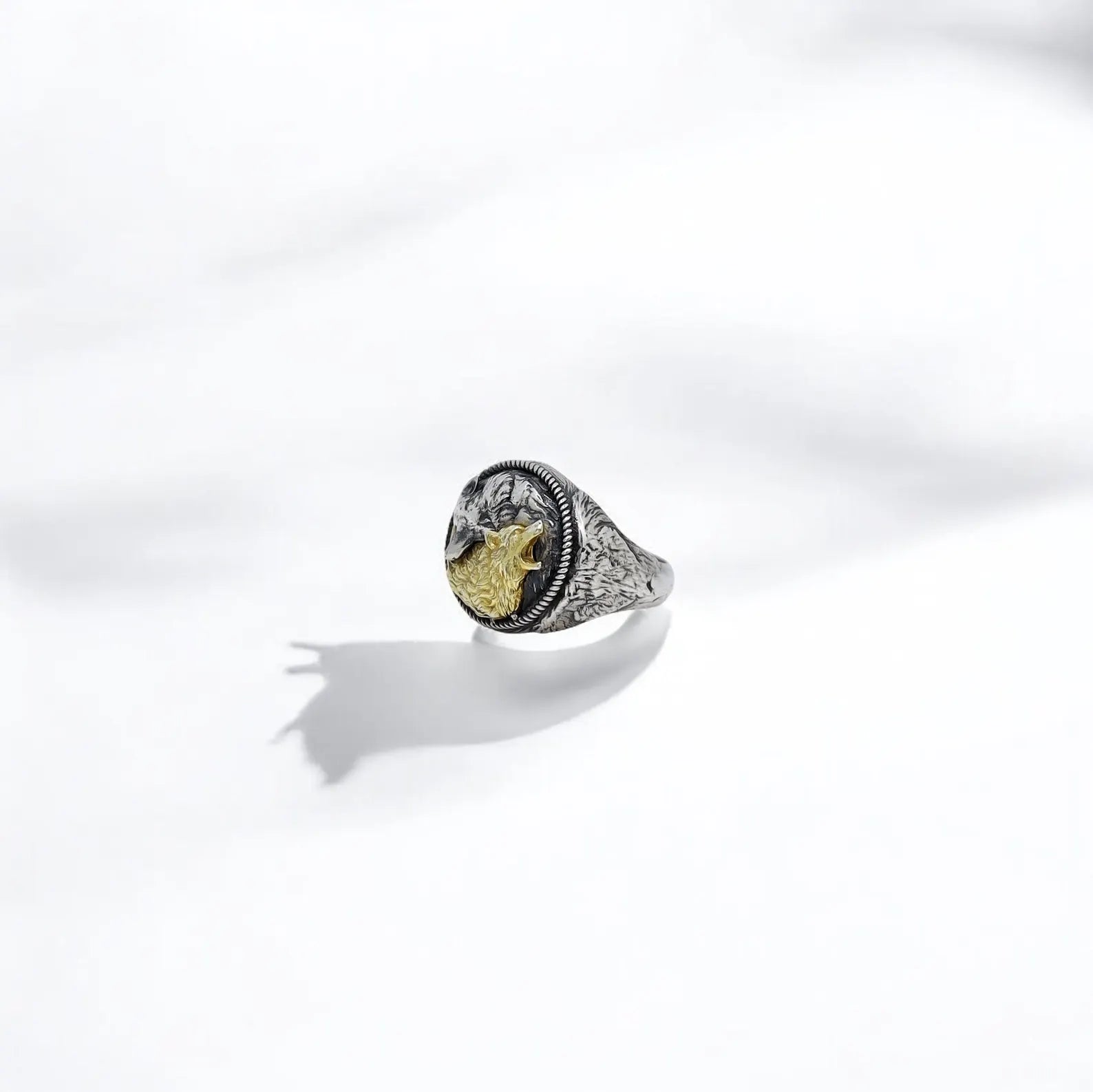 Showcased on a rustic surface, this spiritual wolf ring stands out with its striking blend of polished silver and radiant gold plating. The wolf and yin yang elements represent personal power and harmony, making this an exceptional gift for boyfriends, husbands, or sons. Crafted for those who value both meaning and style in their jewelry.