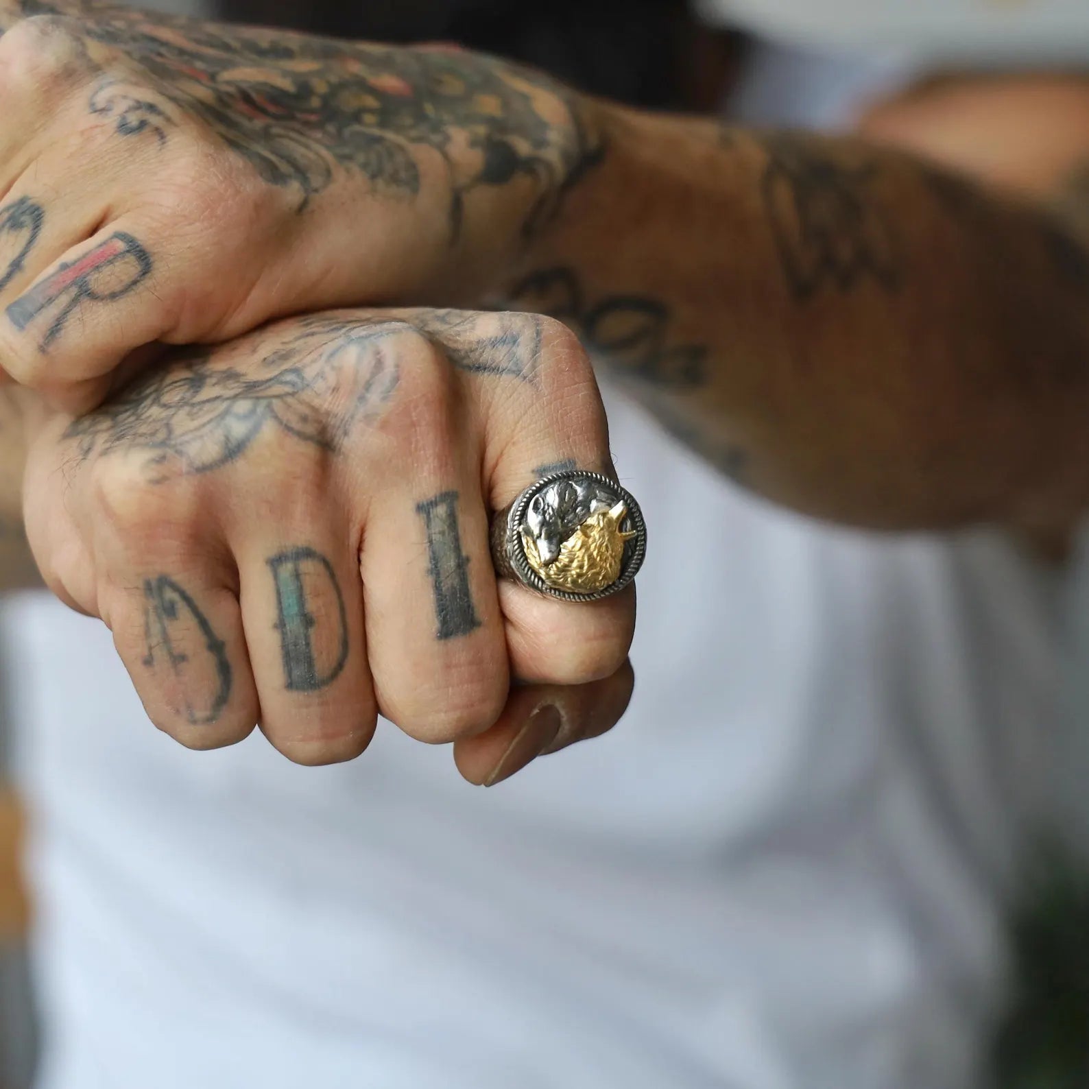 Close-up of this handcrafted gold-plated Yin Yang wolf ring, highlighting the fine details of the wolf’s facial features and the perfect balance of the Yin Yang motif. This spiritual statement ring for men combines the fierce energy of the wolf with the ancient symbolism of duality, protection, and harmony. A perfect accessory for spiritual men and animal lovers who want to make a statement with their jewelry.