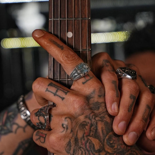 Close-up view of a modern aquamarine birthstone ring in 925 sterling silver with a strong claw setting design, showcasing its radiant shine and elegant craftsmanship.
