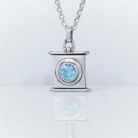 Handmade sterling silver pendant necklace featuring a sparkling aquamarine gemstone in a vintage-inspired square design. This March birthstone jewelry piece symbolizes clarity, courage, and harmony. Perfect as a meaningful gift for her on birthdays, anniversaries, or holidays. Elegant artisan craftsmanship makes this aquamarine necklace a timeless treasure for everyday wear.