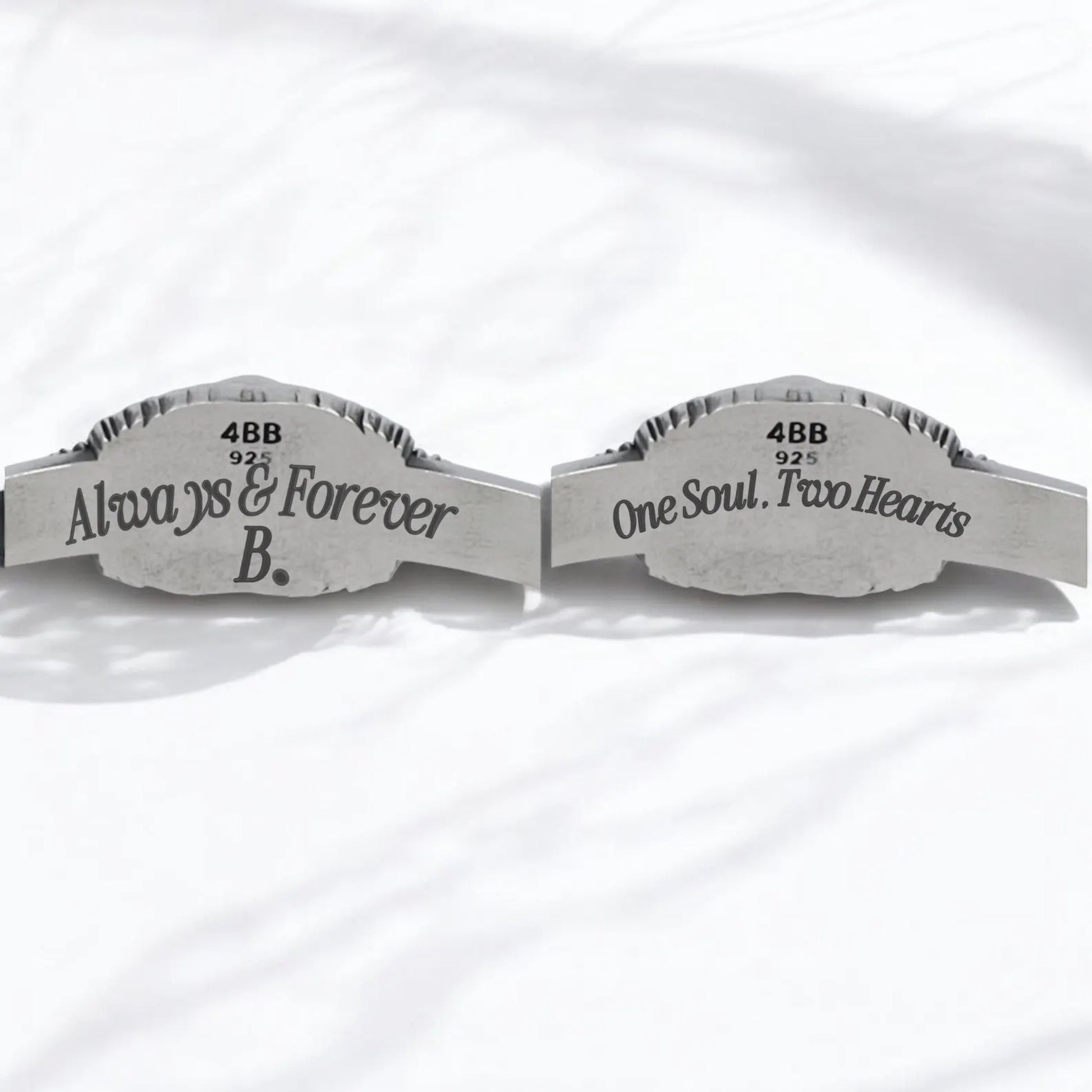 Detailed macro view of a sterling silver gothic bracelet showcasing a deep blue kyanite gemstone and twin skull engravings. The oxidized texture enhances the vintage look, making it an ideal statement piece for men’s gothic fashion.