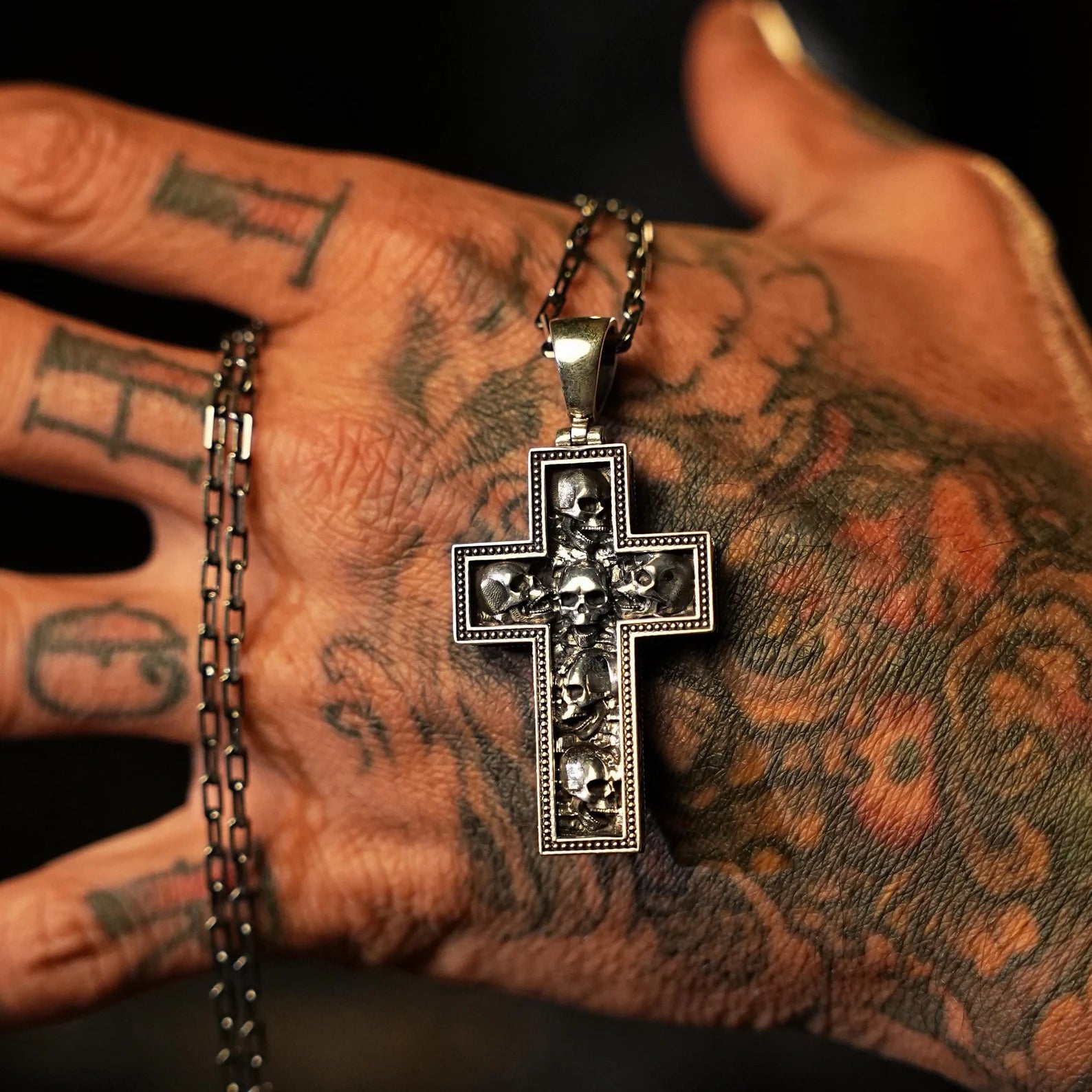 Sterling silver skull cross pendant necklace for men, ideal for gothic fashion and biker style lovers. Intricate skull details in a heavy-duty cross design, perfect for concerts, rides, and everyday edgy looks. A statement gift piece.