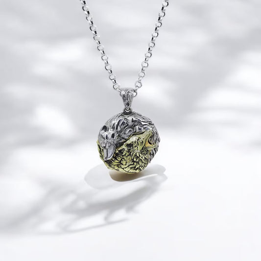 Handcrafted Silver Yin Yang Wolf Necklace featuring a dual-tone design with sterling silver and 14k gold plating. This symbolic pendant captures the spirit of balance and duality, with two intertwined wolves representing calmness and power. A powerful unisex necklace ideal for nature lovers, spiritual souls, and those seeking harmony. Perfect for gifting or personal wear.