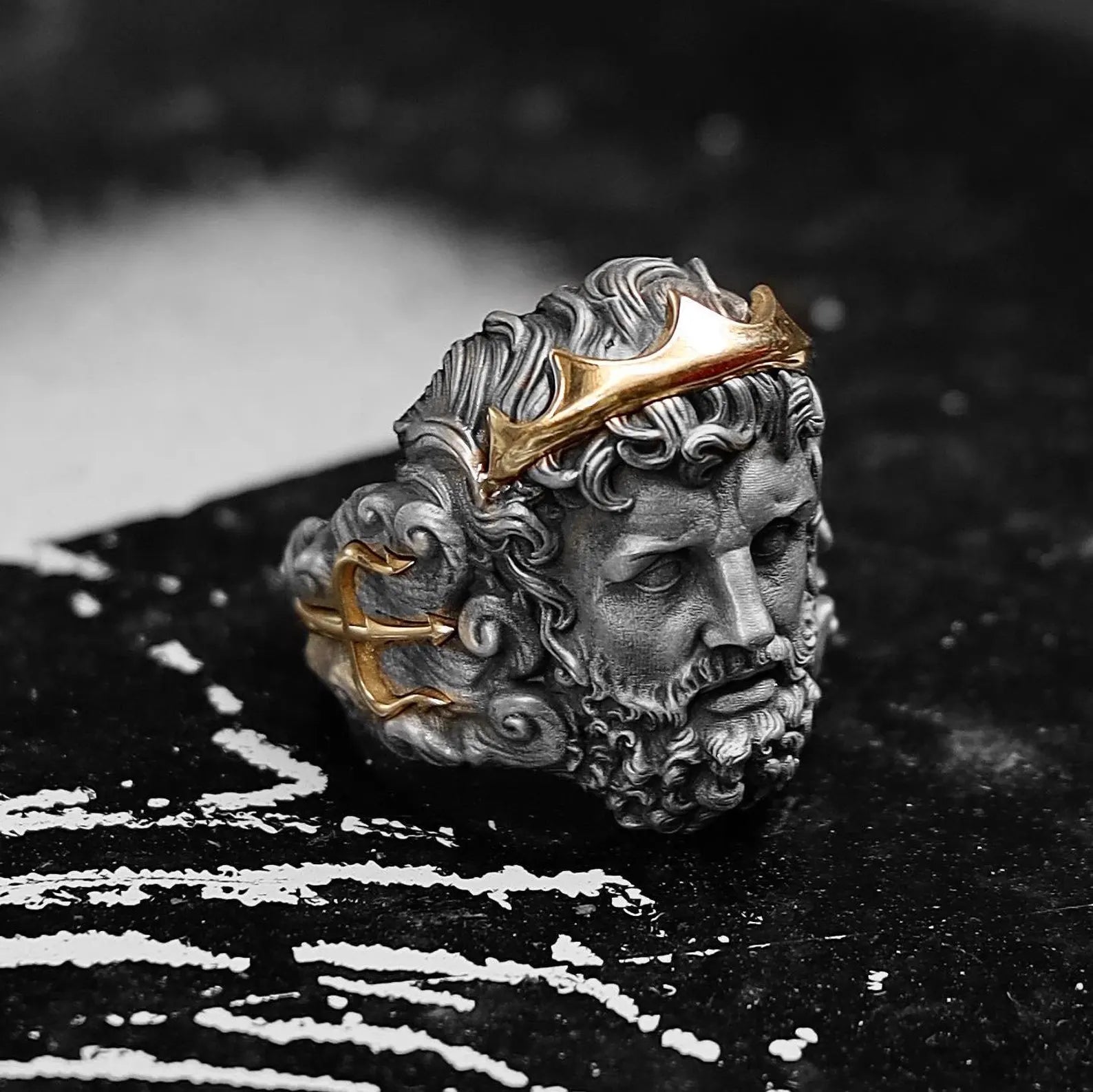 Symbolizing divine strength and elemental mastery, this Poseidon ring is crafted from high-quality sterling silver with a polished 14K gold inlay that adds warmth and dimension. Every detail is carved by hand to reflect the majestic essence of the Greek god of the sea. Ideal for men with a deep appreciation for storytelling, spiritual symbolism, and powerful design,