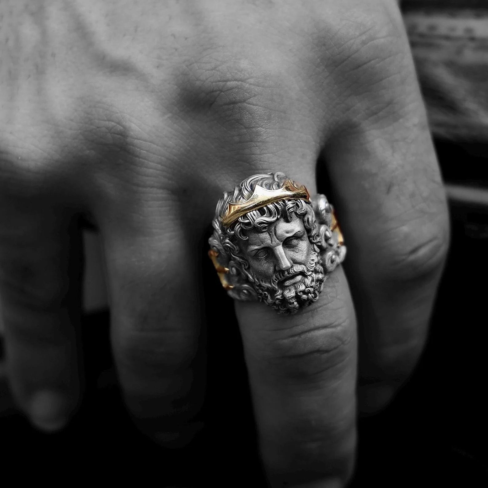This handcrafted Poseidon ring merges symbolic meaning with premium materials, combining 21 grams of solid sterling silver and 2.3 grams of 14K gold. The design draws directly from ancient depictions of the sea god Poseidon, featuring flowing waves, tridents, and maritime icons that represent dominance over nature’s raw forces. Custom sizing makes it comfortable for everyday wear, while the mythology-inspired style makes it unforgettable in formal or ceremonial settings.