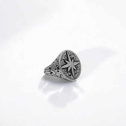 A handcrafted 925 sterling silver compass ring featuring an intricately detailed compass rose design, symbolizing guidance, direction, and inner strength. Made for men who embrace the spirit of exploration, this nautical signet ring is perfect for birthdays, anniversaries, or as a meaningful gift for anyone beginning a new chapter in life.