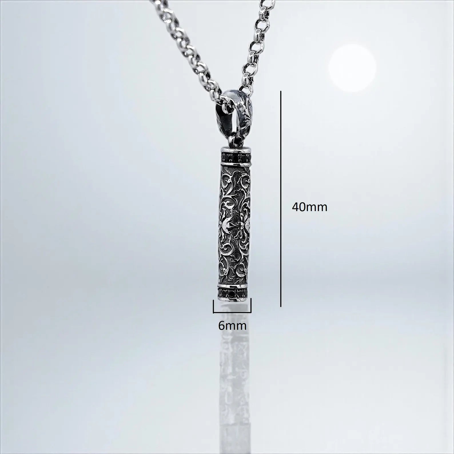 Floral cylinder pendant necklace handmade in 925 silver with gothic detailing. A stunning accessory for men and women who admire dark vintage elegance. Ideal for SEO on Shopify and Etsy, and highly shareable on Pinterest gift guides and Instagram reels with moody jewelry themes.