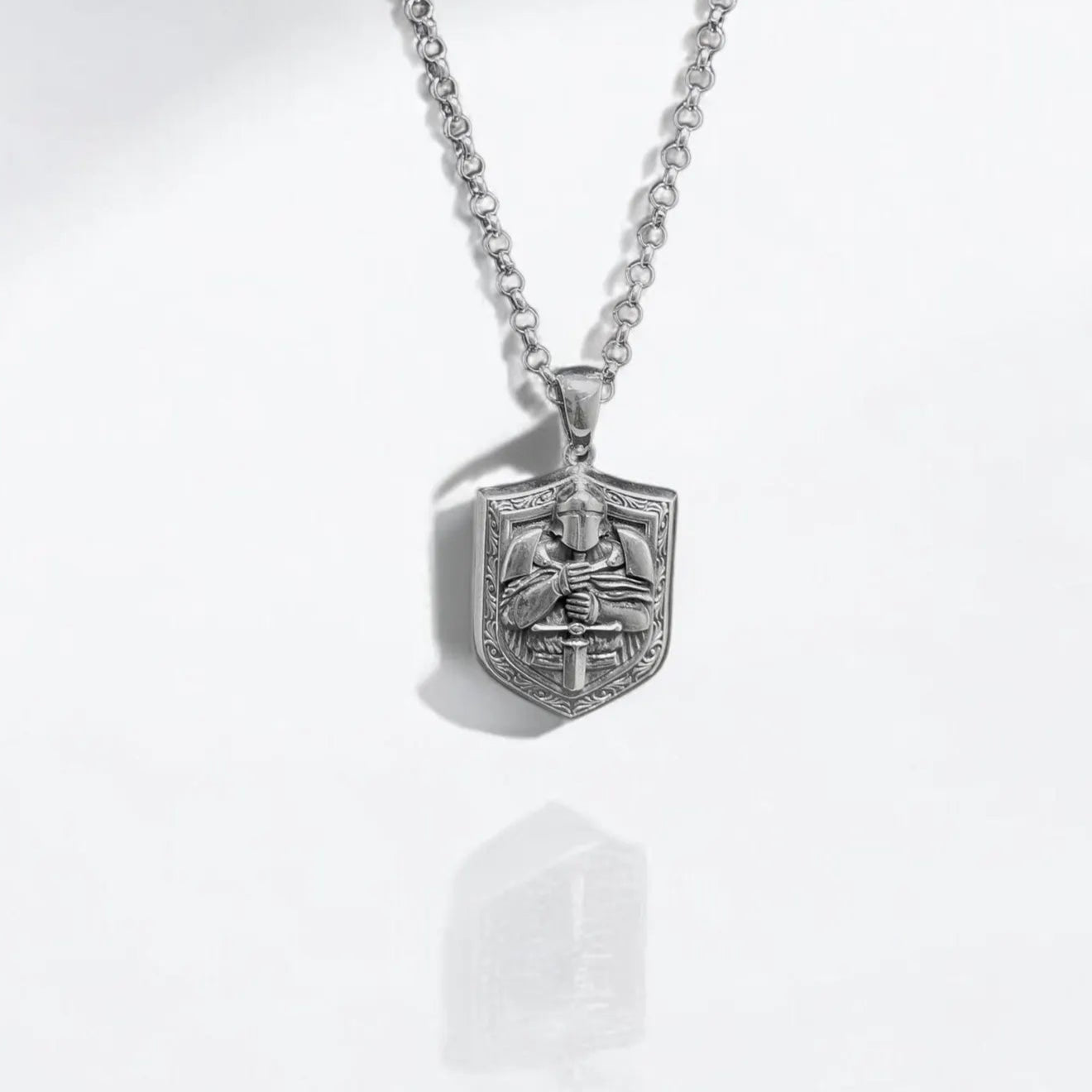 Handcrafted silver warrior armor necklace pendant featuring a medieval knight holding a sword. Perfect for men who love fantasy, gothic, and historical jewelry. Durable sterling silver design, ideal for cosplay, collectors, and unique gift ideas.