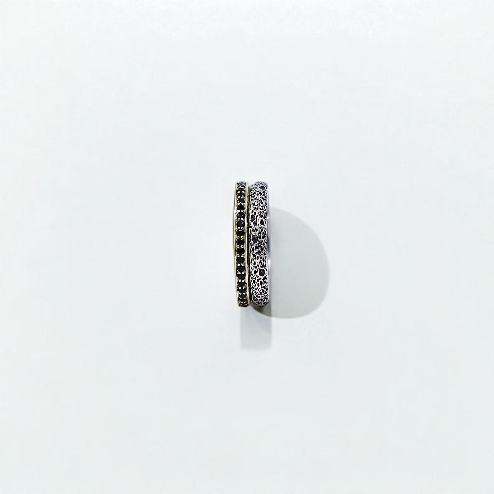 Side-by-side image of two sterling silver rings with oxidized texture and gold-plated border, one engraved with “Always Forever” and the other with “One Soul, Two Hearts.” A perfect symbolic gift for engagements, anniversaries, or