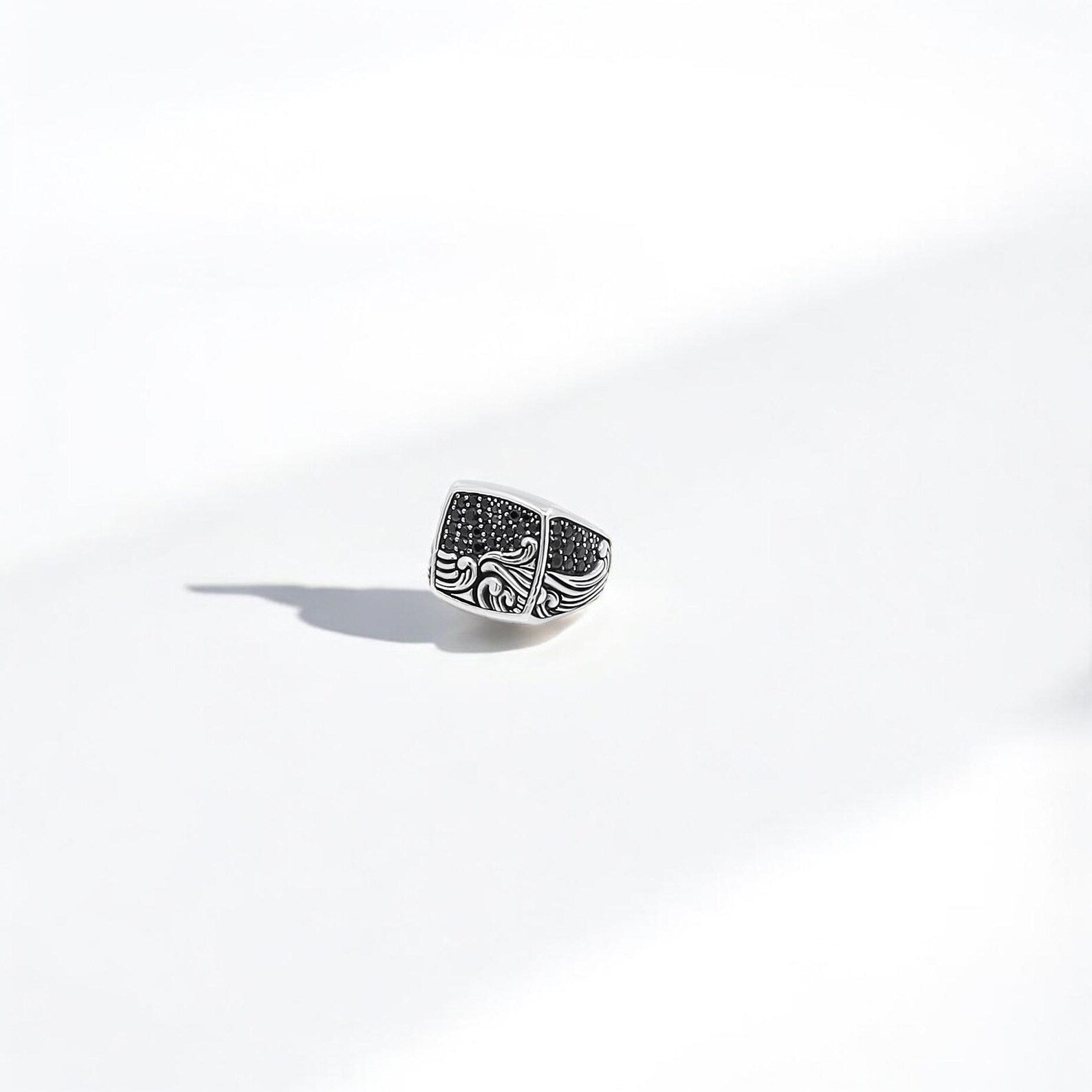 Designed for adventurers, dreamers, and ocean souls, this handmade silver wave ring showcases a dramatic seascape scene etched in fine detail. The night sky above the waves gives the ring a celestial character, making it more than just a piece of jewelry—it becomes a wearable story and symbol of wanderlust.