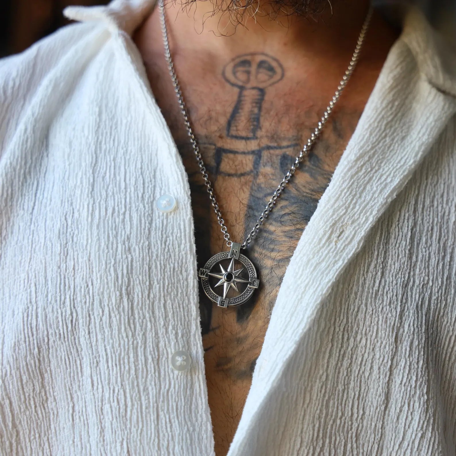 Unisex sterling silver North Star compass pendant necklace, handmade with nautical detail and polished finish. Symbolizing guidance, courage, and hope, this timeless accessory is perfect for men and women alike. A meaningful sterling silver jewelry gift for him or her, suitable for everyday wear or special occasions with symbolic elegance