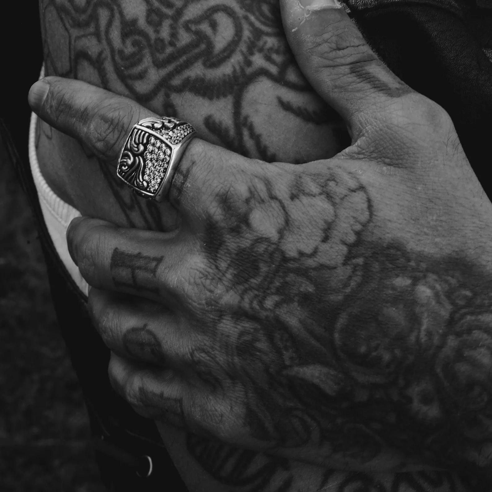 This unique sterling silver wave ring is inspired by the enduring rhythm of the ocean. Hand-engraved with dynamic wave patterns and finished with a surface of radiant zircon stones, the ring captures the ocean’s duality—its calm and chaos. Perfect for men who seek to carry the spirit of the sea wherever they go, this piece makes a heartfelt gift for anniversaries, graduations, or milestone birthdays.