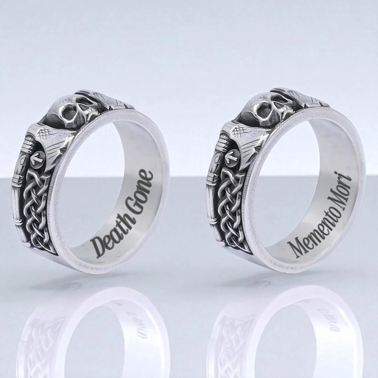 Detailed view of a gothic Viking ring with engraved skull and axe symbols, crafted from 925 sterling silver. Designed for men who embrace bold and masculine styles, this handmade band features intricate Nordic knotwork. Perfect for fans of Norse legends, historical reenactments, or as a unique silver gift idea for him.