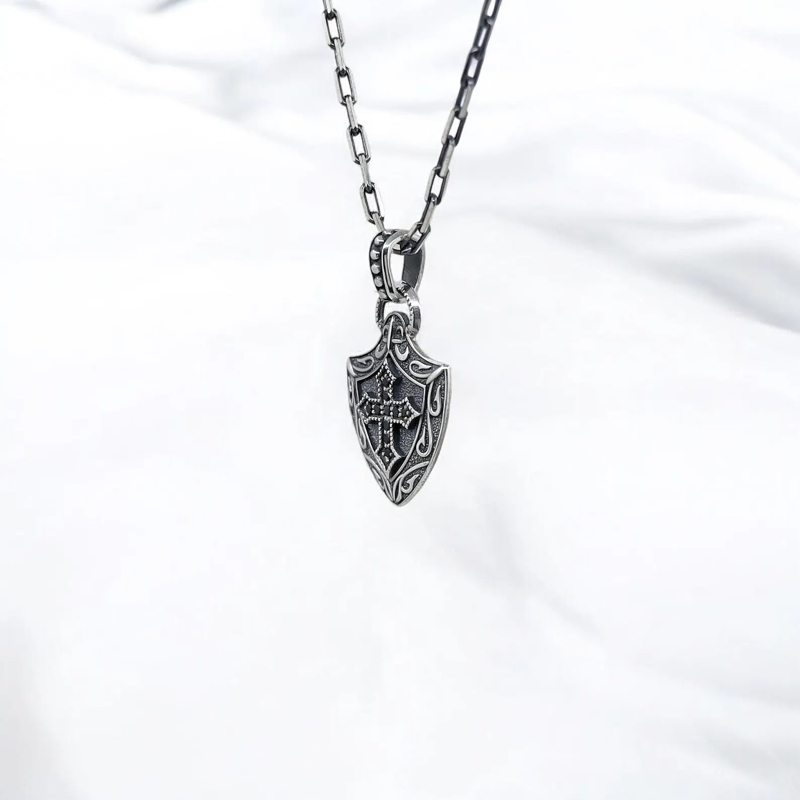 Medieval warrior necklace in solid sterling silver with a Gothic cross detail, reflecting inner strength and noble spirit. This handcrafted pendant is an excellent gift for fans of knight lore, fantasy aesthetics, and symbolic silver jewelry.