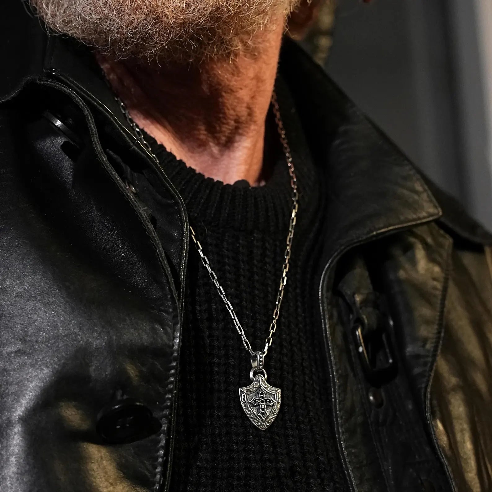 Antique-style sterling silver necklace inspired by the Knights Templar, featuring a central cross motif engraved into a shield-shaped pendant. Perfect for gothic jewelry collectors, historical accessory enthusiasts, and those who appreciate battle-worn beauty and strength.