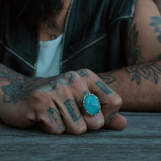A unique silver ring for men made from high-quality sterling silver and showcasing a luminous aquamarine gemstone, carefully mounted in a claw-style setting. This boho gemstone ring is ideal for personal expression and spiritual energy, combining fine craftsmanship with striking visual presence to create a memorable gift for anniversaries or birthdays.