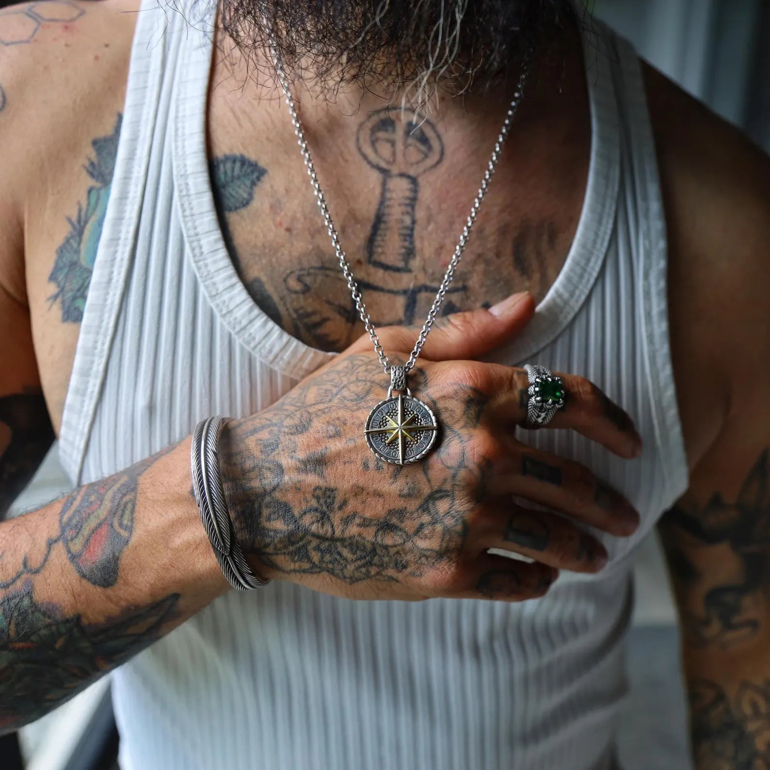 Discover this artisan-made compass necklace, crafted from premium sterling silver and 14k gold, representing guidance, exploration, and inner strength. A perfect accessory for ocean dreamers, maritime collectors, and lovers of symbolic fine jewelry. Makes a lasting and personal gift for special occasions.