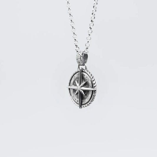 Elegant sterling silver compass pendant necklace designed for ocean lovers and seekers of adventure. This handcrafted nautical jewelry piece features a finely detailed north star compass symbol, representing direction, guidance, and personal journey. Perfect for men and women, this unisex necklace is an ideal accessory for everyday wear or special occasions. A popular Etsy gift idea for birthdays, anniversaries, and Father’s Day..