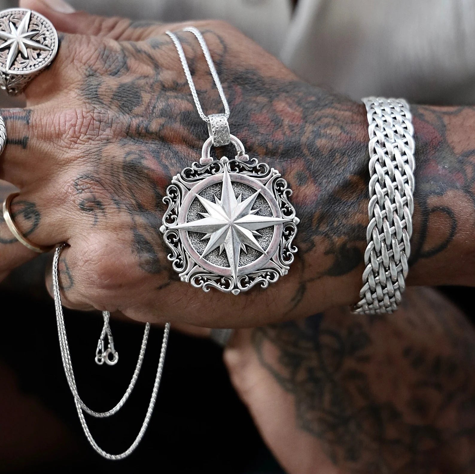 Side profile view of this elegant compass pendant necklace, highlighting the expert handcrafted design and refined nautical details. Made from high-quality sterling silver, this men’s compass pendant represents travel, spiritual connection, and the timeless pursuit of discovery. Ideal for those who love unique, alternative jewelry and want to express their adventurous spirit in style.