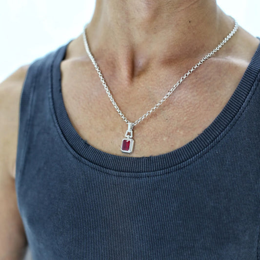 The deep red hues of the ruby evoke passion and strength, making it the perfect accessory to symbolize love, power, and grace.