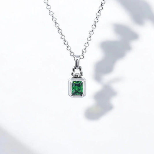 A luxurious handmade necklace crafted from 925 sterling silver and set with a radiant emerald-cut green zircon gemstone. This unique jewelry piece is designed for men and women who appreciate elegant, timeless accessories that blend artisanal craftsmanship with symbolic meaning. Ideal as a meaningful gift for birthdays, anniversaries, or simply to elevate any outfit with sophistication and grace.