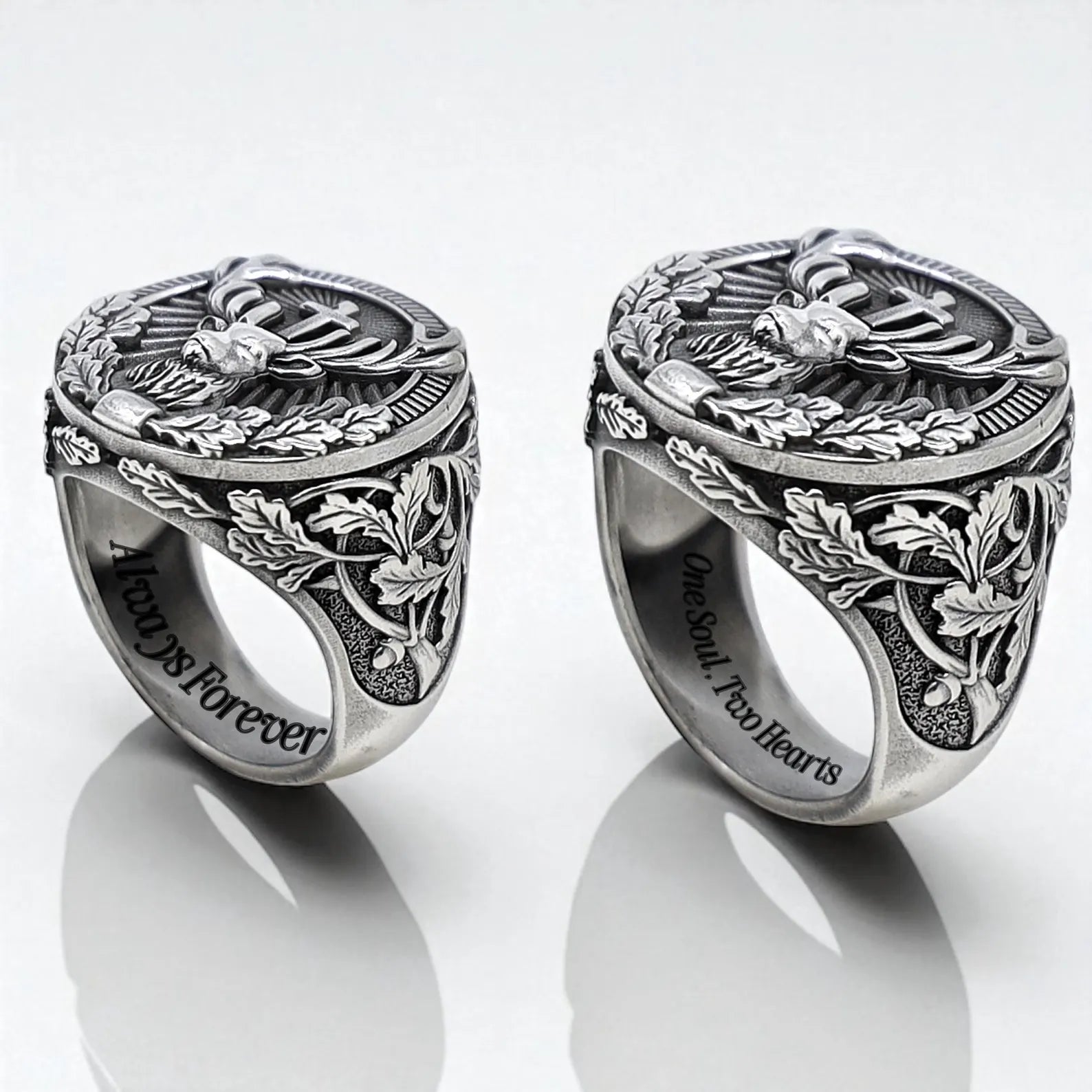 A unique silver ring with an elaborate deer and cross design, showcasing layered botanical carvings on the band. Perfect for anniversaries, birthdays, or outdoor enthusiasts seeking a meaningful, handcrafted accessory.