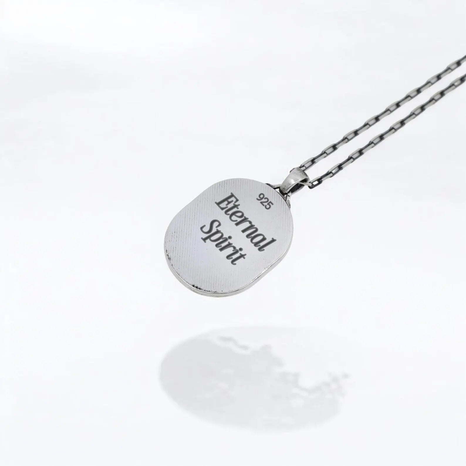 Eternal Blossom necklace handcrafted in sterling silver, featuring an elegant skull cameo adorned with floral carvings. A striking piece of gothic jewelry perfect for expressing individuality, celebrating eternal love, or simply enhancing your unique aesthetic with dark beauty.