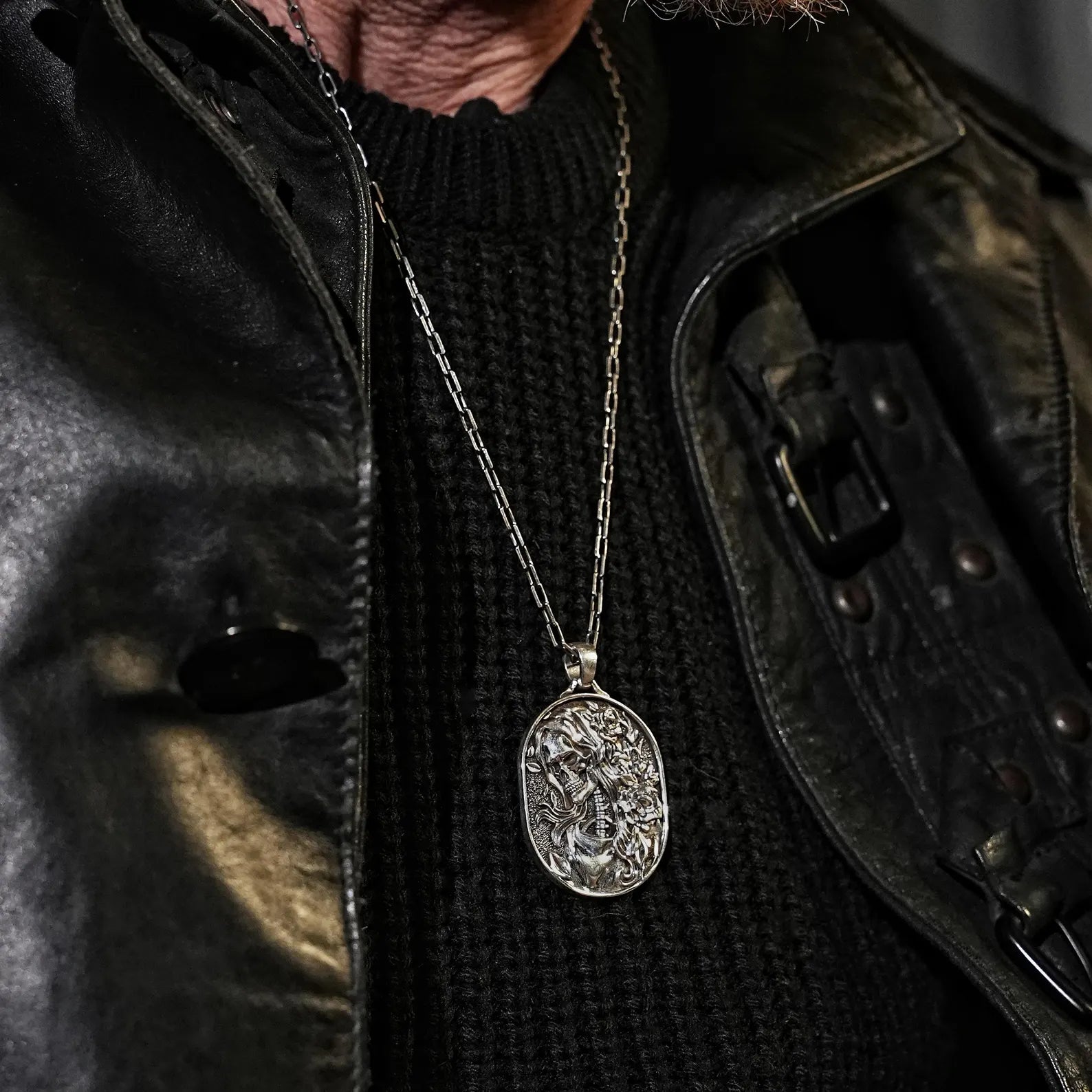 Floral skull necklace with vintage-inspired skeleton art, handcrafted in solid sterling silver. This gothic cameo pendant is designed for those who appreciate edgy elegance, combining death symbolism with timeless floral motifs in a piece that tells a story of eternal love and transformation.