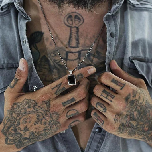 This bold and refined silver necklace showcases a high-quality black onyx crystal set in an ornate, handcrafted sterling silver pendant. Inspired by vintage design with fantasy undertones, it is the ideal gift for men who value elegance, grounding energy, and classic statement pieces.