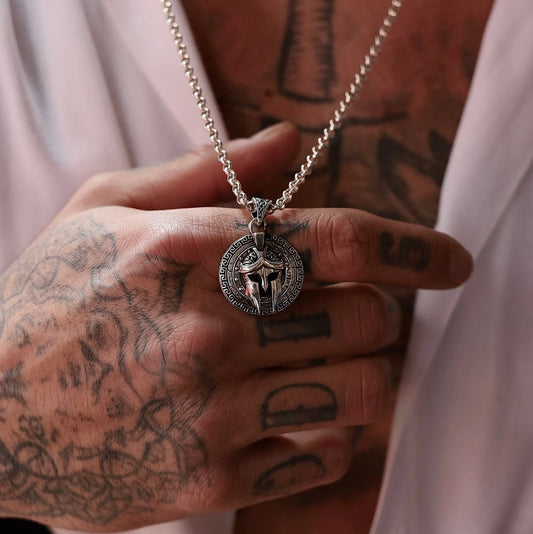 Spartan warrior necklace for men with detailed helmet and shield design in solid sterling silver. A tribute to ancient Greek valor and heroic aesthetics. Great for fans of medieval, fantasy, and historical jewelry. SEO-optimized for Pinterest collections and Shopify handmade listings.