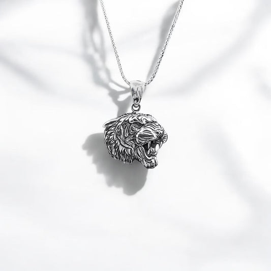 Handcrafted sterling silver tiger head necklace featuring an intricately detailed design that symbolizes courage, power, and elegance. This bold pendant is the perfect men’s accessory for those who embrace their inner warrior. A standout piece in handmade animal-themed jewelry, ideal for everyday wear or special occasions.