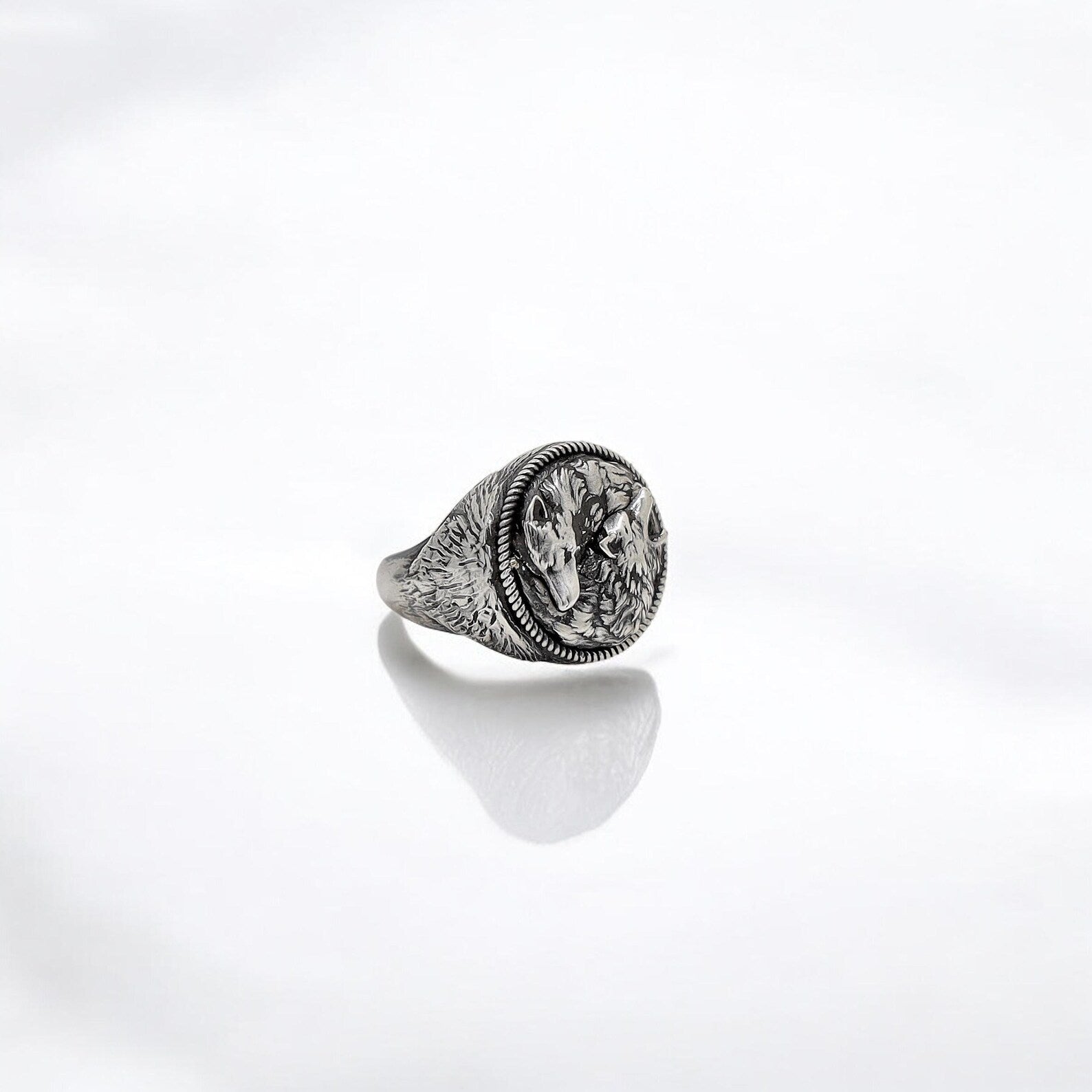 Artisan-designed wolf ring for men, made of solid sterling silver with a yin yang motif. The striking texture and symbolism make this piece ideal for men seeking bold, meaningful, and wearable art.