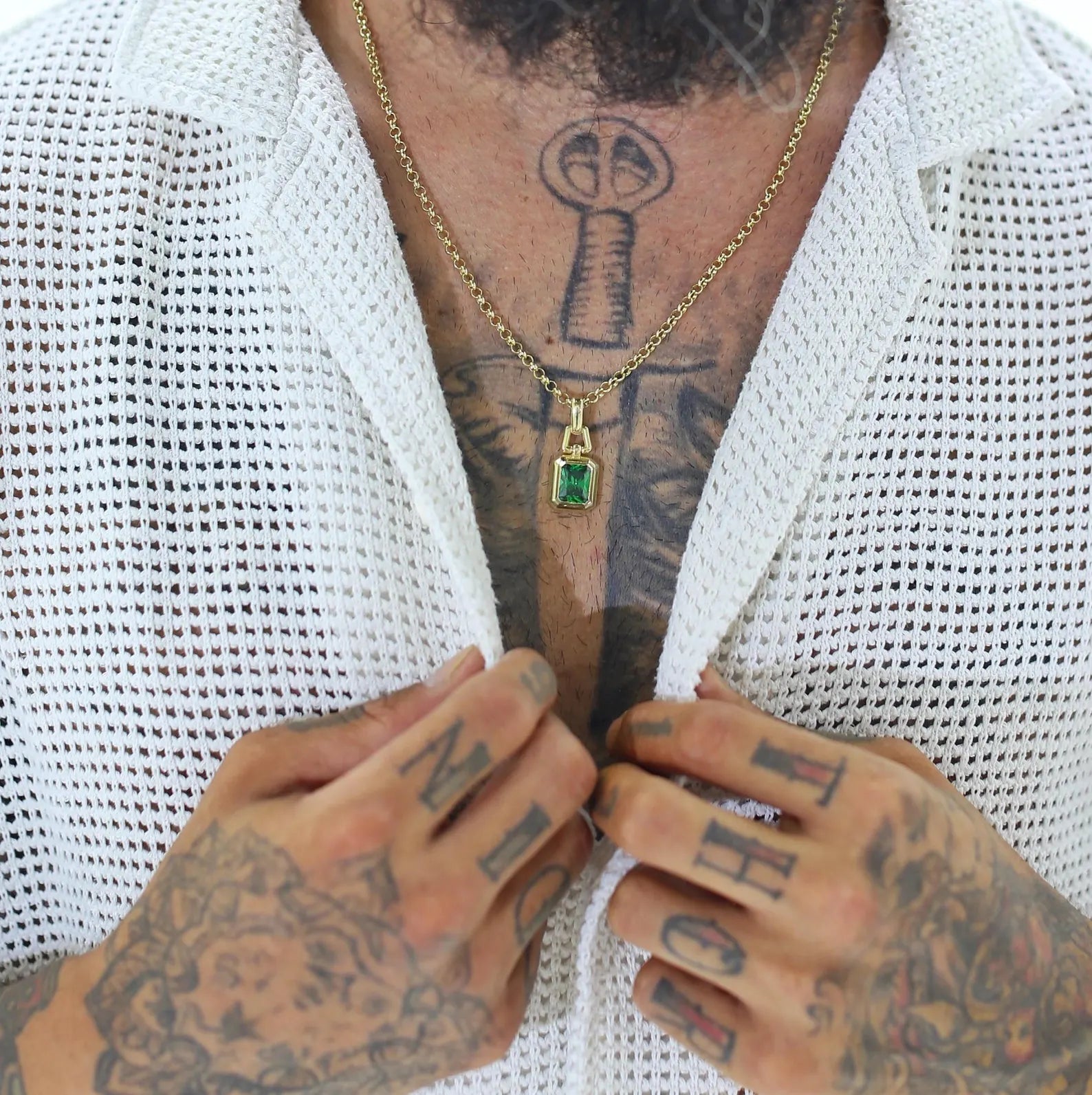 Luxurious emerald pendant necklace in radiant gold-plated silver, designed with elegance and femininity in mind. The vibrant green gemstone adds a pop of color and charm to both casual and formal looks. A perfect jewelry gift for stylish women who love emerald birthstones, gold accents, and handcrafted sophistication.