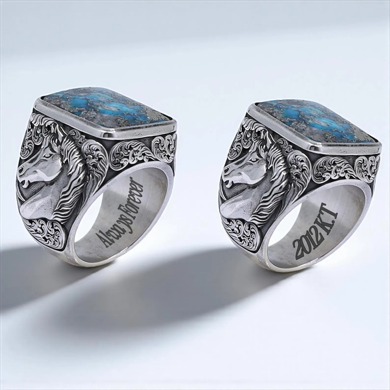 Western-style silver ring for men with a square turquoise gemstone centerpiece and finely carved galloping horse artwork on the side – a unique and meaningful gift for him.
