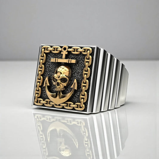 Handcrafted sterling silver skull and anchor pirate ring for men, featuring a detailed nautical design with elegant gold accents inspired by maritime tradition