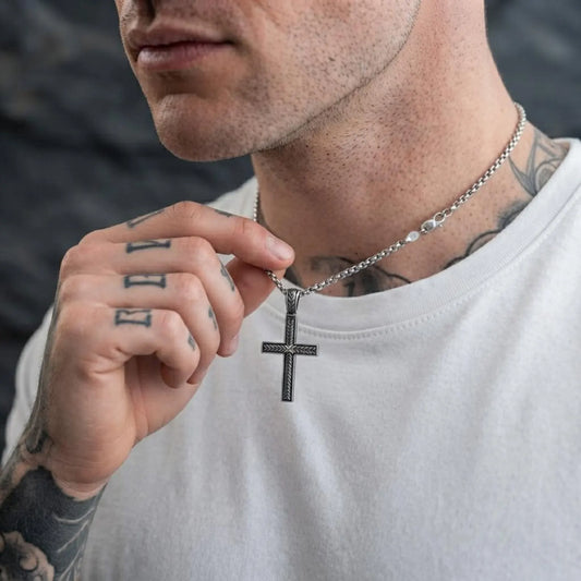 Solid sterling silver braided cross necklace with intricate handcrafted detailing, designed as a timeless piece of sacred Christian jewelry for men and women who cherish their faith.