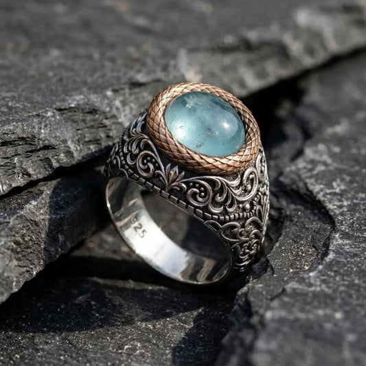 Handcrafted Victorian sterling silver aquamarine signet ring for men featuring a natural round aquamarine cabochon gemstone with intricate vintage engraved details.