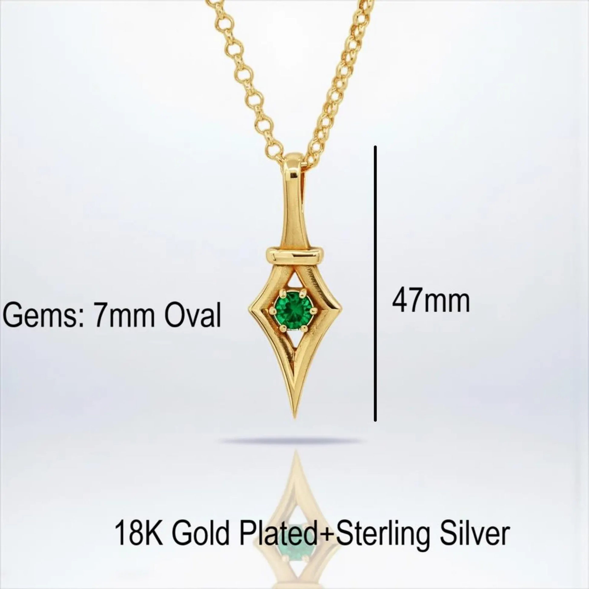 Luxury emerald gemstone pendant necklace inspired by Victorian gothic aesthetics, crafted from gold plated 925 sterling silver