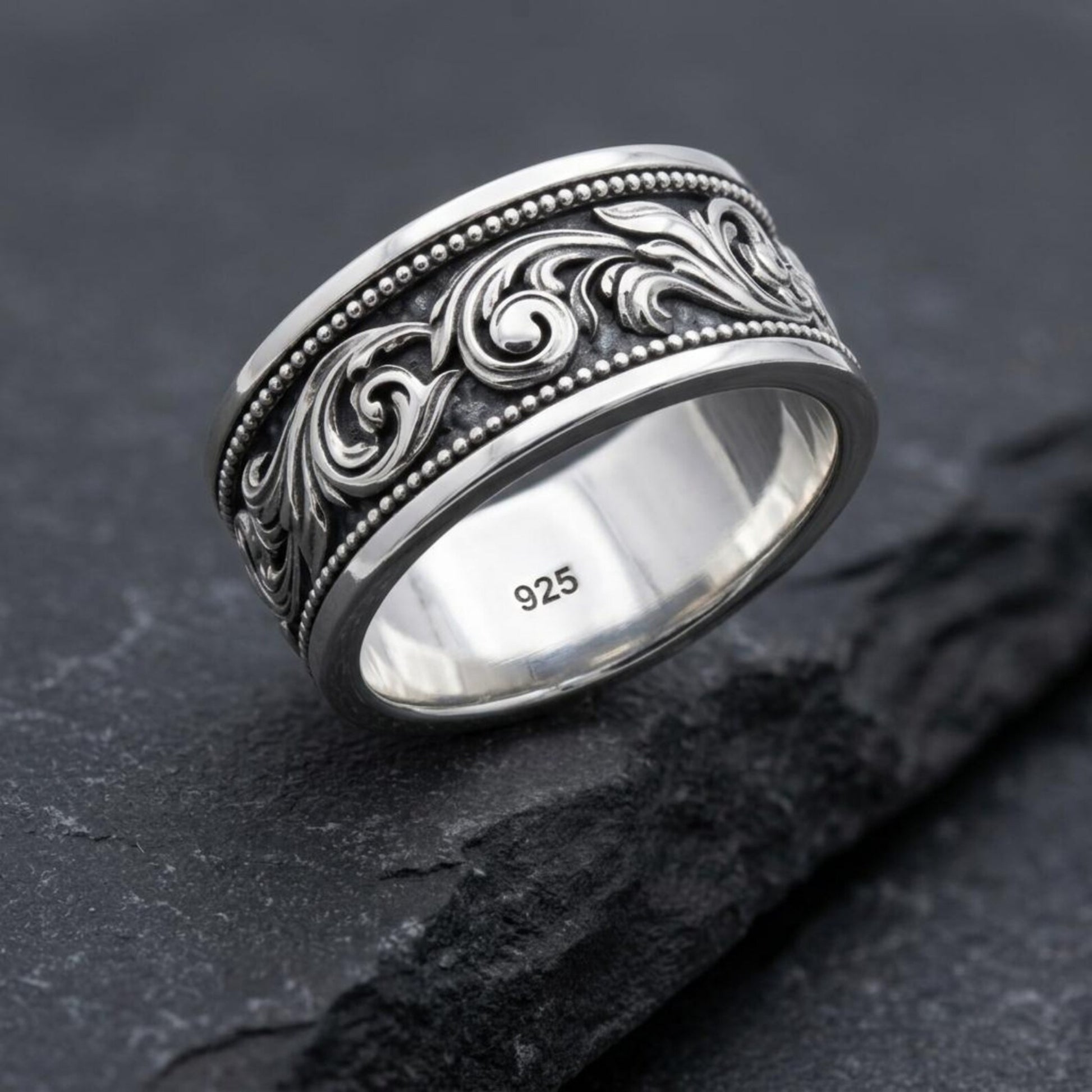 Vintage Baroque Ring handcrafted from 925 sterling silver with ornate grass-inspired heraldic engravings, creating a timeless statement piece with royal character.