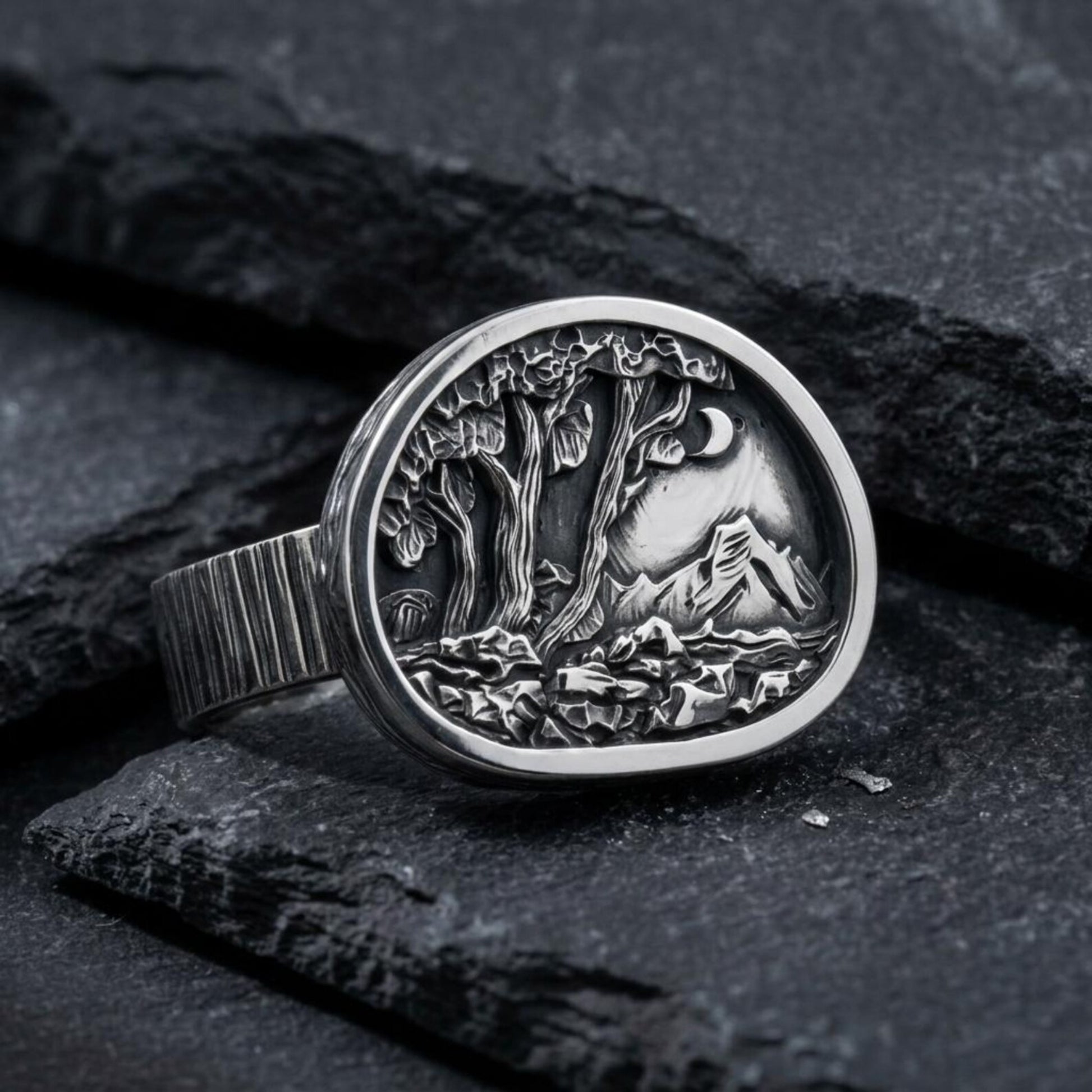 Nature Lover Gift Ring featuring an engraved mountain landscape surrounded by handcrafted silver detailing, representing harmony, strength, personal growth, and a deep appreciation for the outdoors.