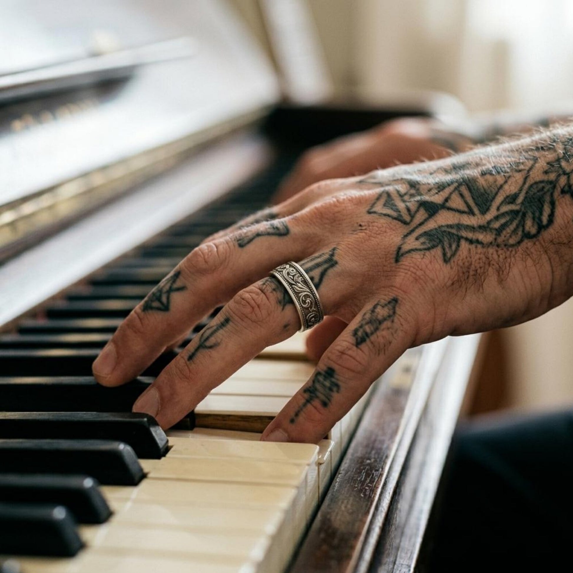 Renaissance Style Sterling Silver Band Ring with elegant heraldic engravings, oxidized accents, and traditional artisan craftsmanship inspired by European history.