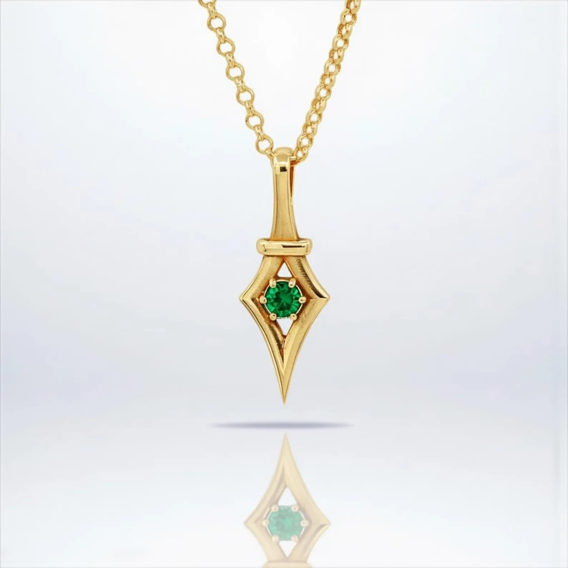 Victorian gothic emerald pendant necklace crafted from 18K gold plated 925 sterling silver featuring a rich green emerald birthstone in vintage inspired design