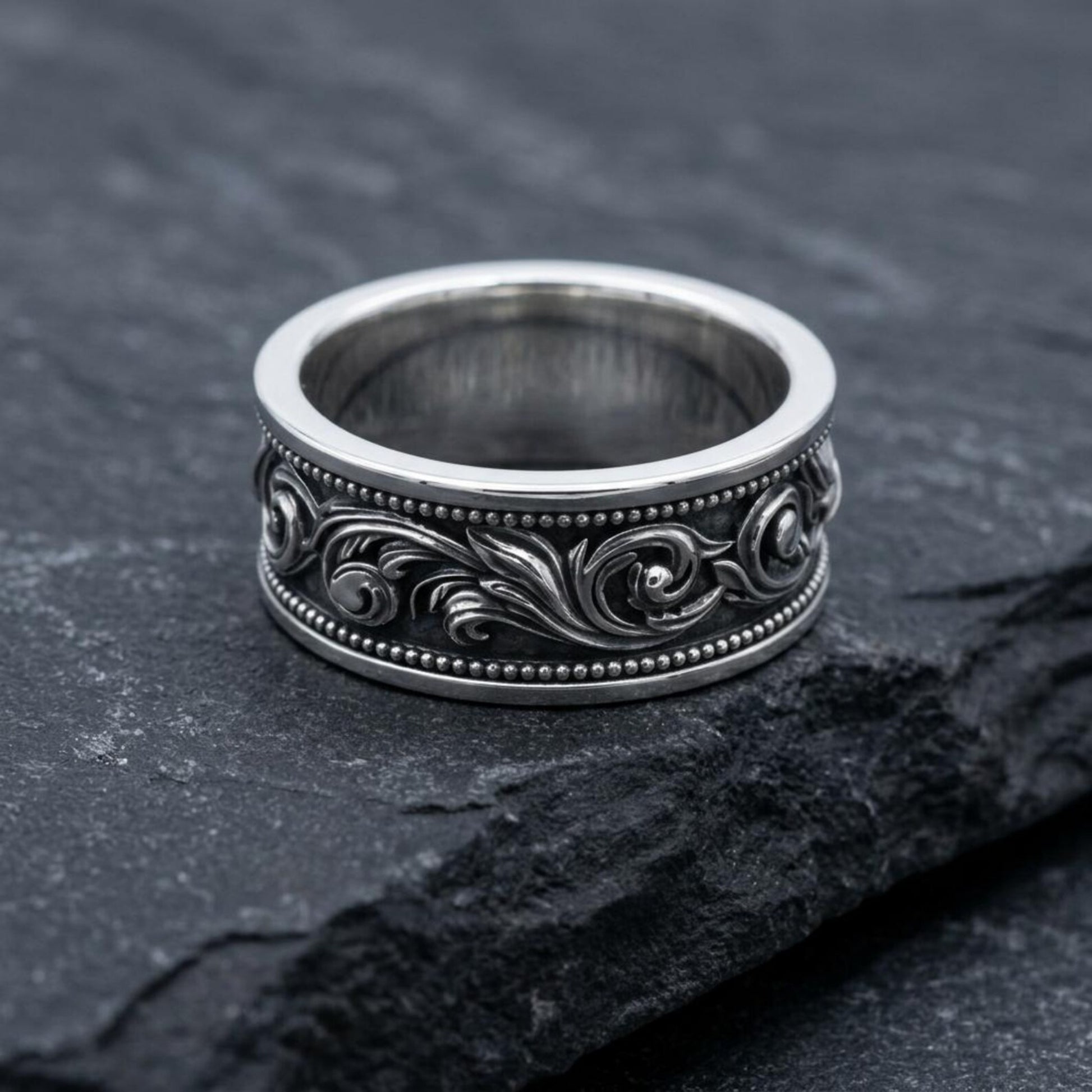 Noble Heritage Band Ring with intricate heraldic ornamentation and Victorian-inspired scrollwork, creating a sophisticated sterling silver statement accessory.