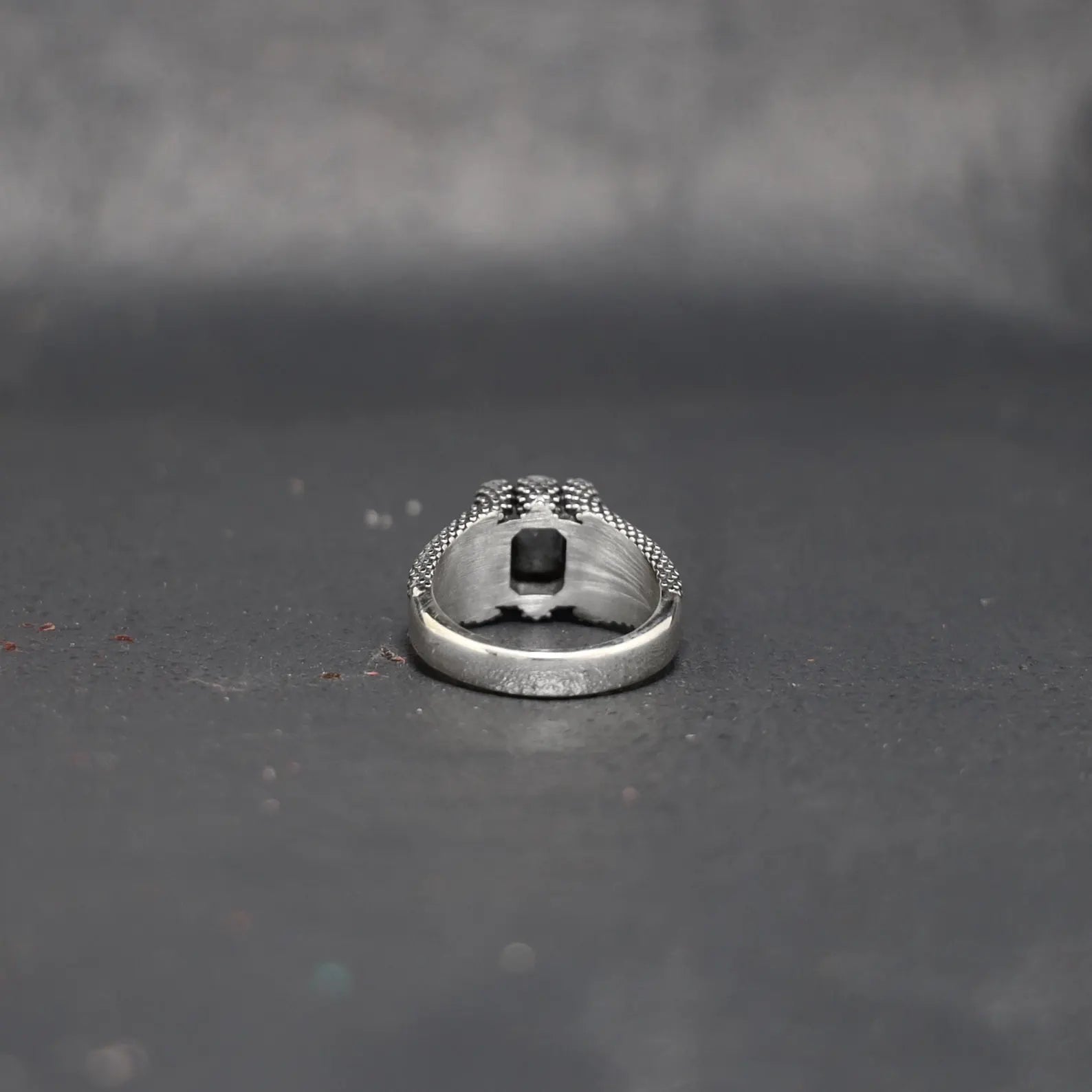 Premium sterling silver aquamarine ring designed with a minimalist gemstone setting, offering a unique blend of elegance, clarity, and masculine statement jewelry.