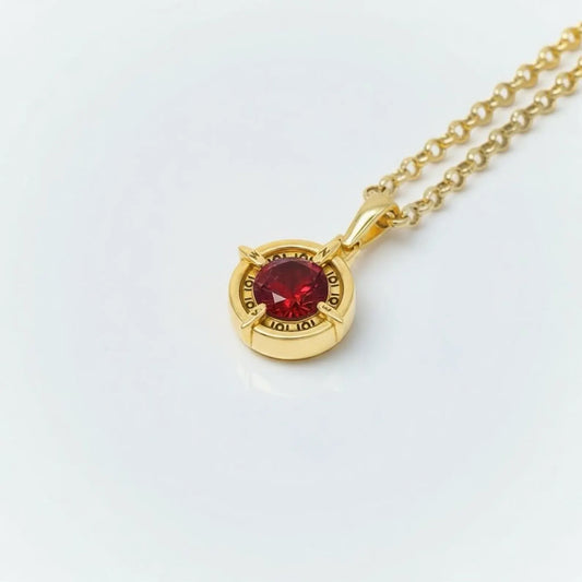 Nautical compass birthstone necklace with garnet gemstone, personalized custom jewelry for meaningful keepsakes.