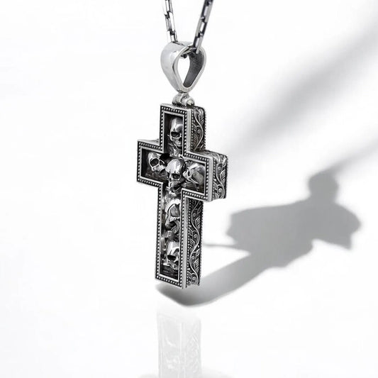 Gothic sterling silver skull cross necklace for men, designed with detailed skull engravings in a bold cross shape. Perfect for biker jewelry lovers, heavy metal fans, and gothic fashion enthusiasts. Durable sterling silver pendant for everyday wear or as a unique gift.