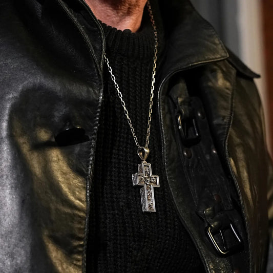 Sterling silver biker cross pendant with 3D skull details, ideal for men’s gothic style. Perfect for rockers, bikers, and heavy metal fashion. Unique handcrafted design that blends bold style with symbolic meaning, making it a standout jewelry gift.