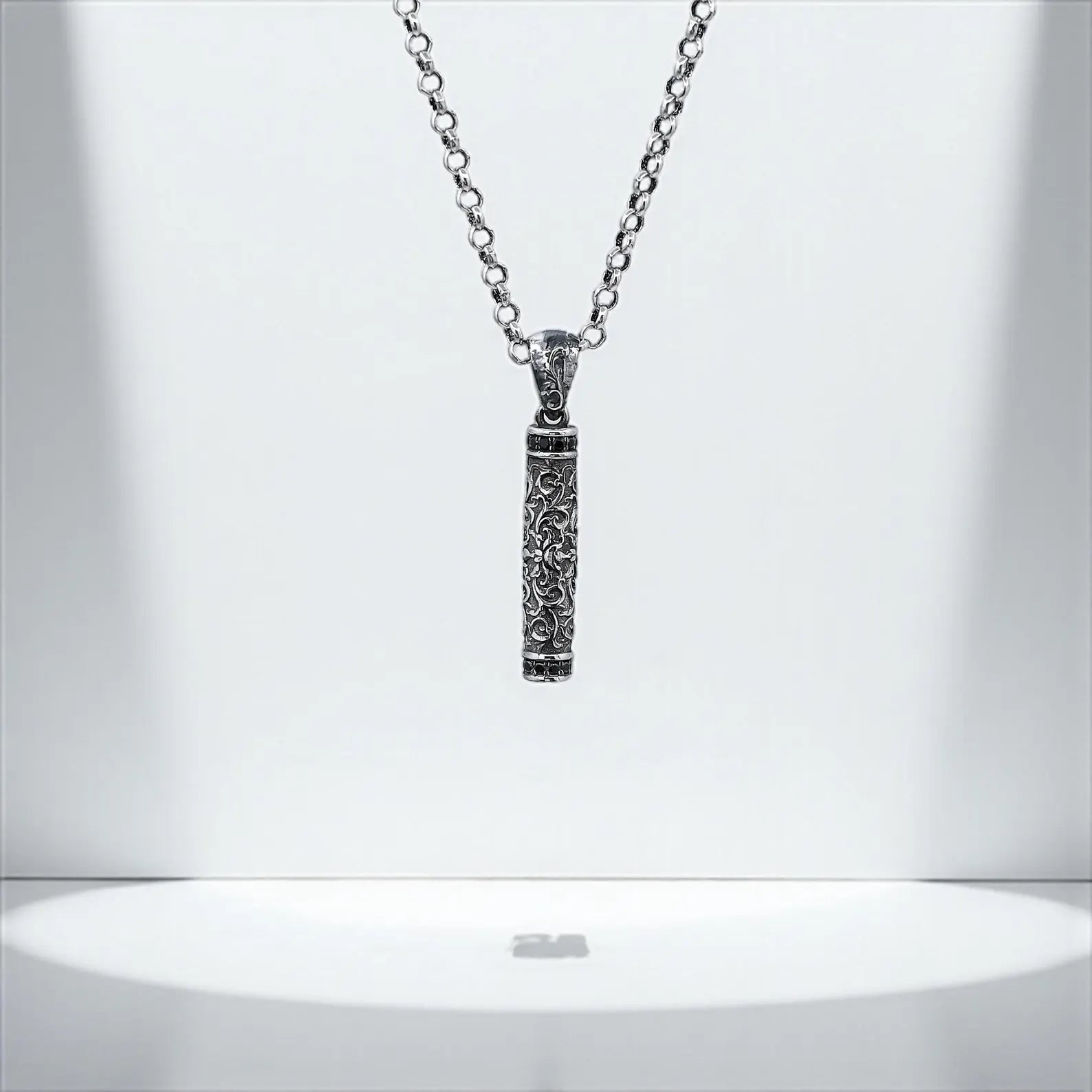 Handcrafted sterling silver necklace featuring an ornate gothic floral cylinder pendant. This vintage-inspired design suits both men and women, making it a unique unisex gift. Ideal for lovers of bar pendant styles and antique flower jewelry. Perfect for Pinterest gothic fashion or Shopify jewelry listings.