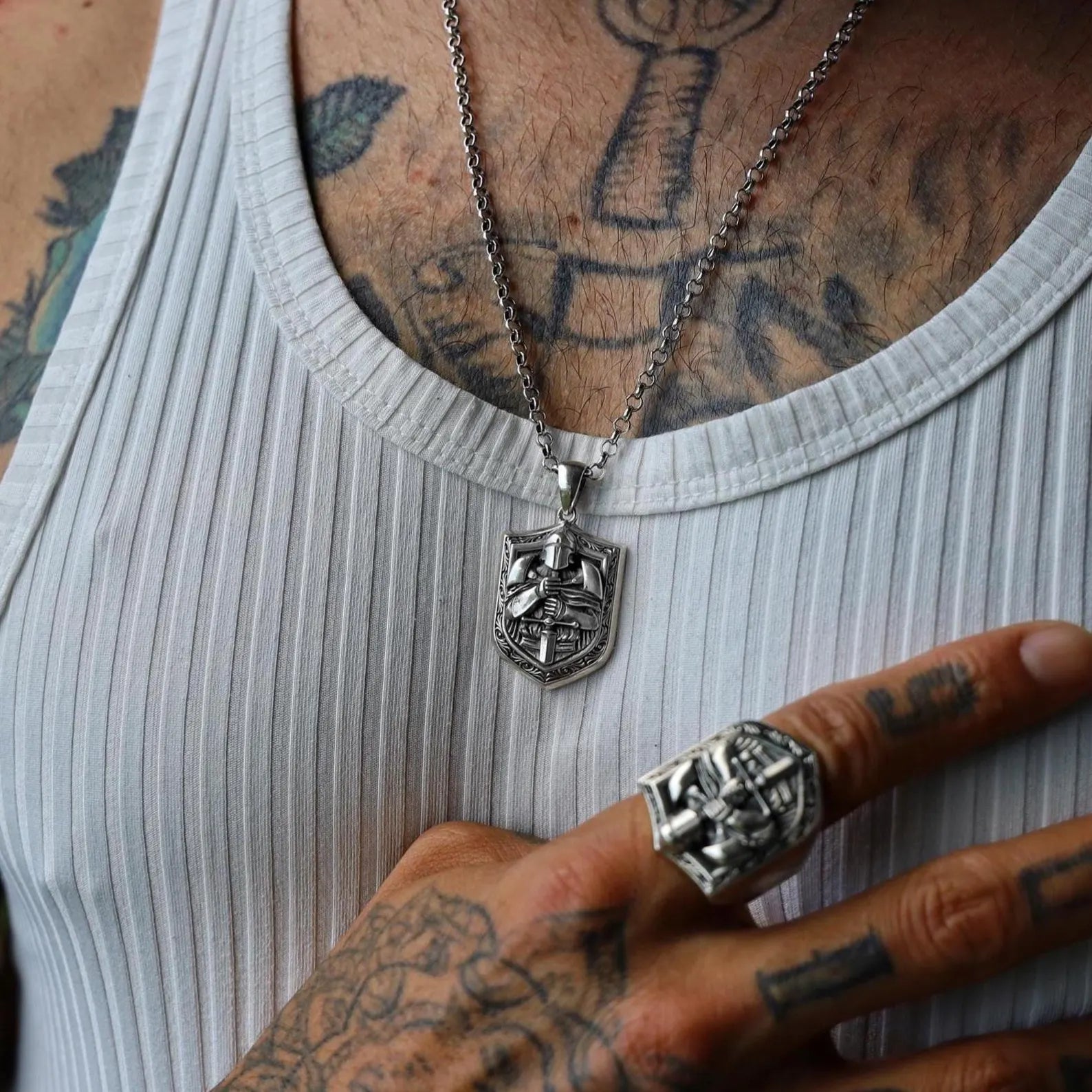 Viking and medieval knight style silver pendant necklace, designed with warrior armor and sword details. Ideal for men’s gothic outfits, fantasy cosplay, and collectors of unique handcrafted jewelry pieces.
