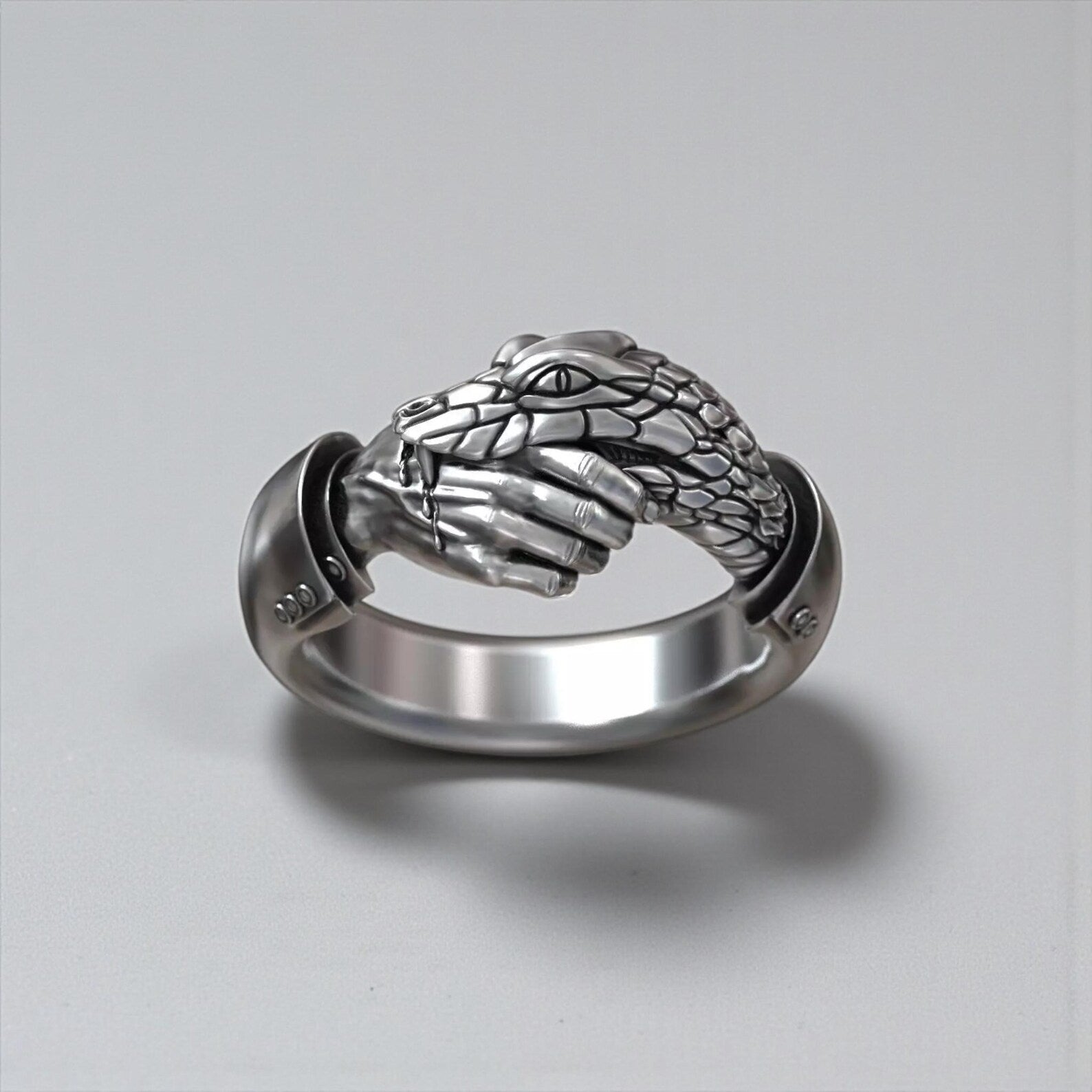 Handmade Handshake Trust No One snake ring crafted from 925 sterling silver, featuring gothic serpent and hand design with oxidized finish, symbolizing loyalty, betrayal and dark masculine power